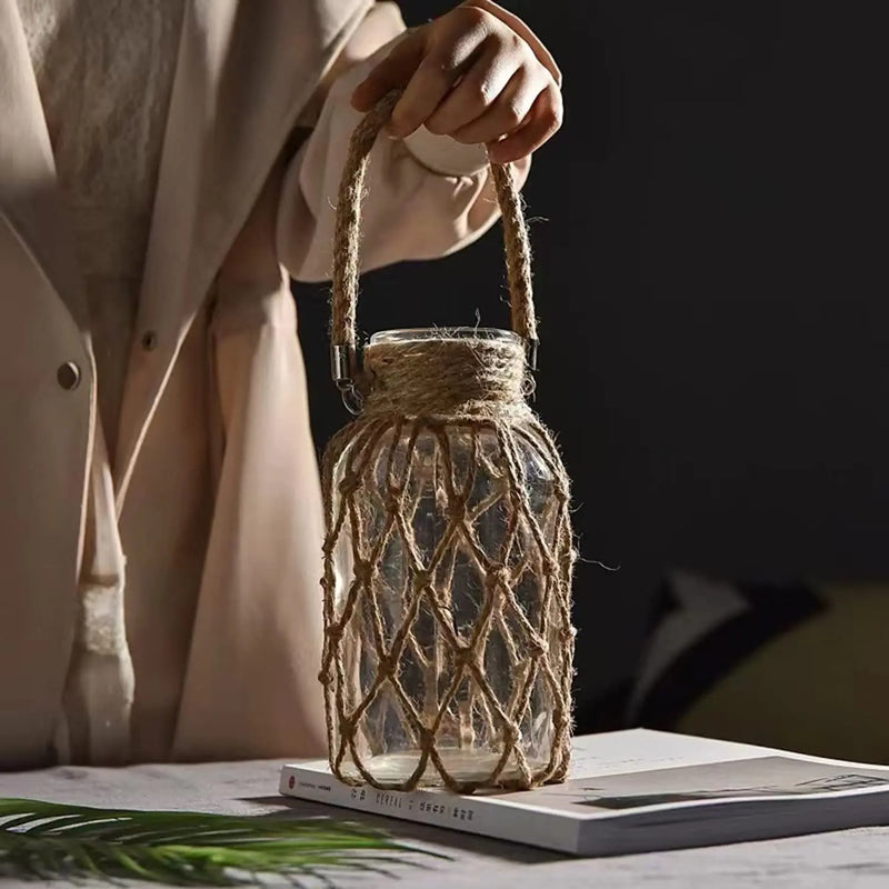 Vaso decorativo de vidro rústico pendurado feito com corda de cânhamo artística